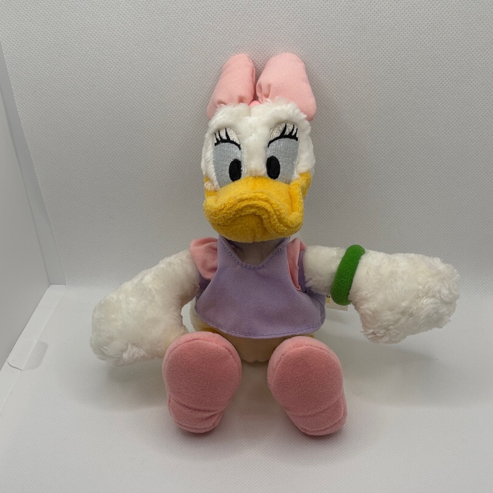 Disney Store World Plush Small Bean Bag Daisy Duck with Green Bracelet